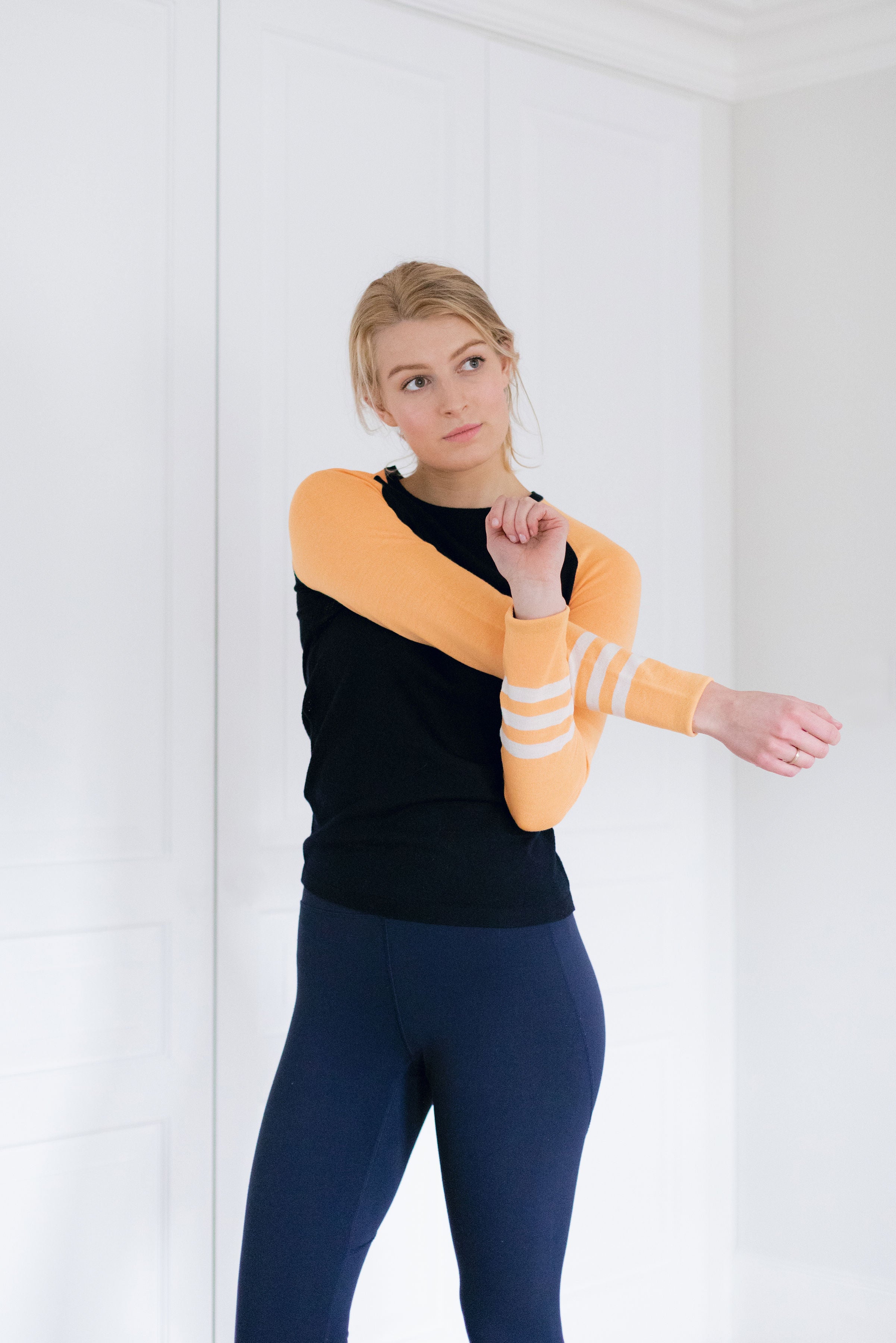 Under-Birdie base layer in navy & vibrant orange